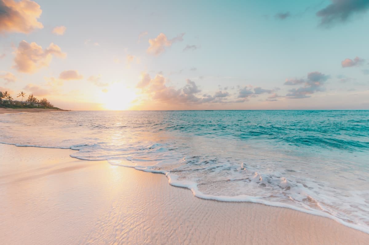Gold Coast beach and coastal cityscape representing the suburb-specific local SEO opportunity spanning the 50km coastal strip from Coolangatta to Coomera for Queensland businesses